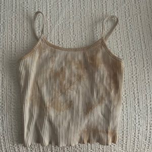 Tan and white tank-top with spaghetti straps.
